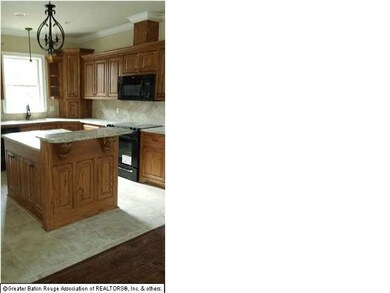 Kitchen with 3cm granite and oak cabinets and tile