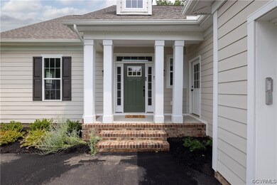 Property entrance featuring a porch