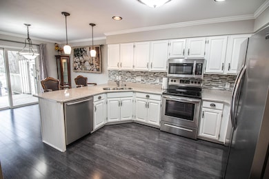 Kitchen w/ Crisp White Cabinetry