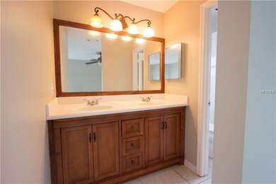 Solid maple dual sink vanity with custom cultured marble top.Master Bath