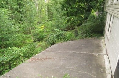 View Behind House with Woods