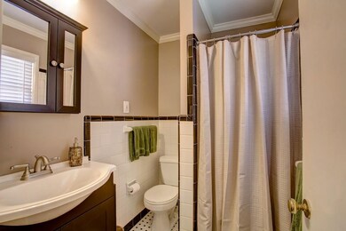 Master bath with updated vanity, fixture, and fresh paint