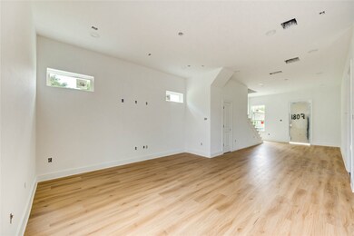 Showing the living room and dining room area