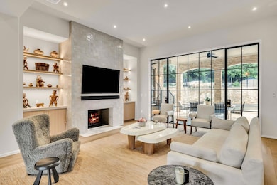 Living room featuring wood finished floors, plent