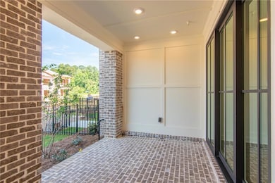 Covered Terrace Patio leads to a front door and a 