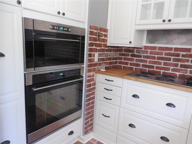 Built-in convection oven, microwave and cooktop