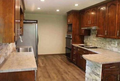 Kitchen comes with stainless refrigerator and new dishwasher 
