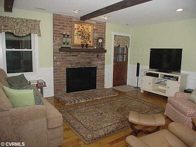 Den/Family/Great Room - Family room with brick woo