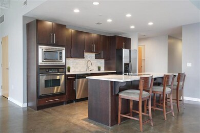 Chef's Kitchen with Marble Tile Backsplash