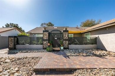 View of front of home with a fenced front yard, st