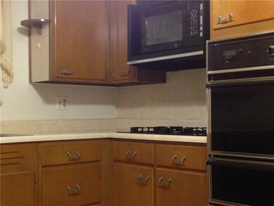 The kitchen is quite large - should accommodate a