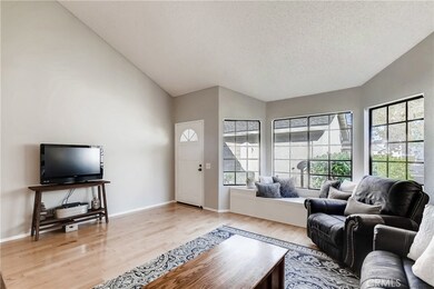 Hardwood Floors, Vaulted Ceilings, Bay Windows w/Built-in Window Seating & Freshly Painted.