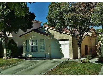 Property Photo. Garage faces south and front door