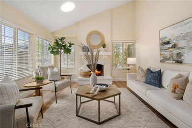 High ceilings in the living room upon entry, with plenty of natural light.