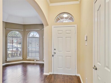 Front Entry with Coat Closet with view to bay wind