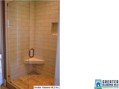 Master bath has separate shower and soaking tub.