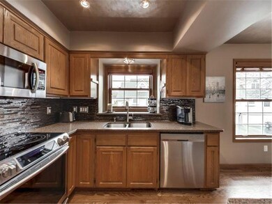 Granite counter tops and tile backsplash
