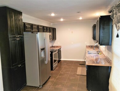 Kitchen area with stainless steel appliances!