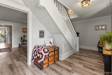 The foyer greets you with the staircase leading up