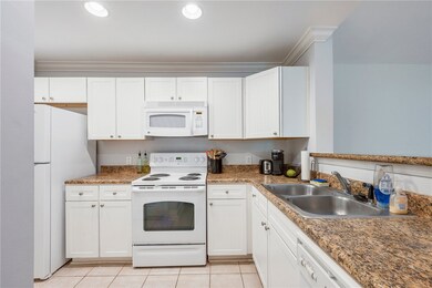 The kitchen is small but mighty with plenty of sto