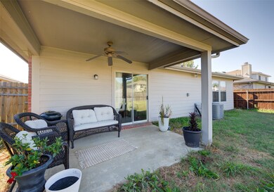 View of patio / terrace featuring a ceiling fan