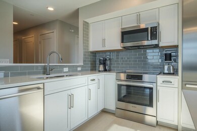 Quartz countertops, tile backsplash