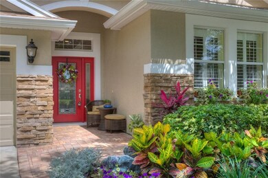 Lush Landscaping and Stone Accents at Entry