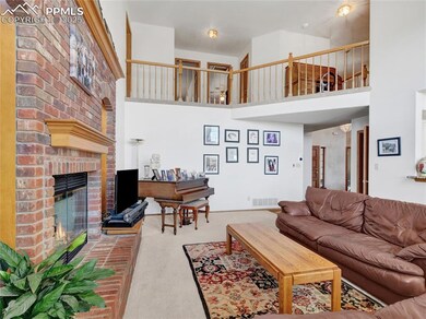 Living area featuring visible vents, carpet floori