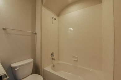 Private Guest Suite Bathroom has Tub/Shower with Tile Surroundings!