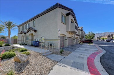 View of property exterior featuring an attached ga