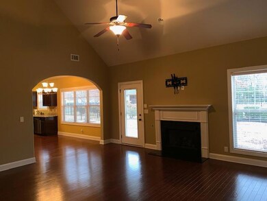 LOTS OF BEAUTIFUL HARDWOOD FLOORS IN LIVING ROOM