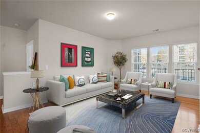 Living room with wood-type flooring
