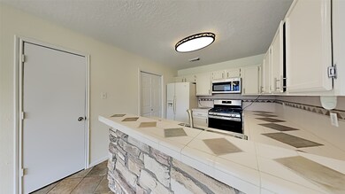 8619 Pine Falls Dr, Houston, TX 77095 - photo 6