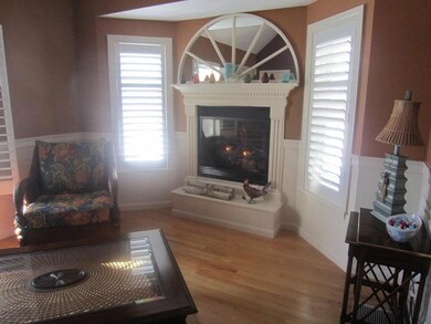Raised gas fireplace with custom...