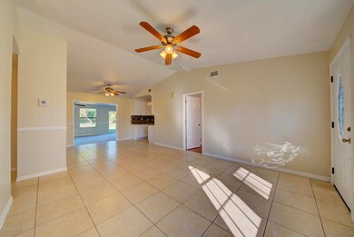 living room open to dining area