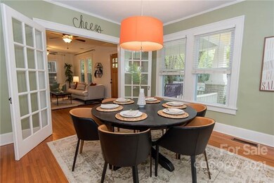 Gorgeous, original french doors leading into the d