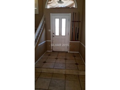 Entry Hall. Tiled Entrance with Step Down
