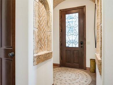 Foyer featuring baseboards and healthy amount of 