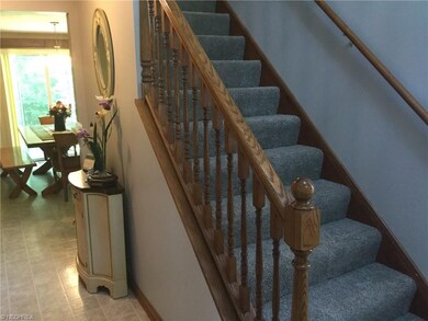 Foyer with oak staircase and brand new Stain Maste