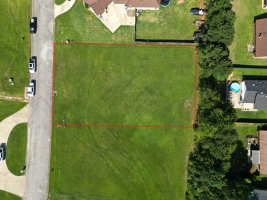 Aerial view of property's location with property parcel outlined