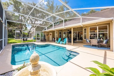 This light filled POOL HOME delivers standout curb appeal, mature landscaping, and an expansive private feel, all in the heart of Oviedo with easy access to TOP-RATED SCHOOLS, shopping, dining, UCF, and major highways!
