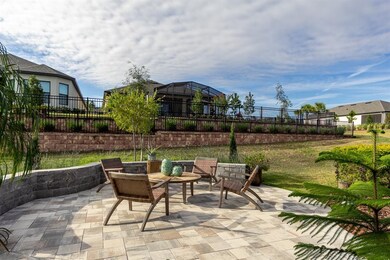 Entertain in the back yard at the pavered firepit!