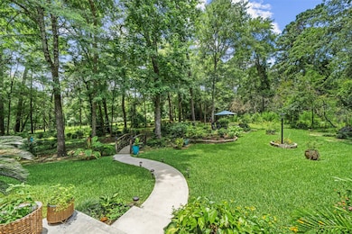  A half acre of open green meadow lies beyond the