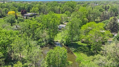 Aerial photo showing pond and rear yard.