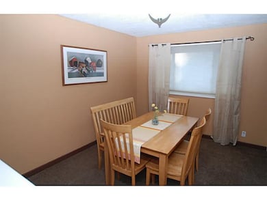 Dining Room. This dining room has a half wall open