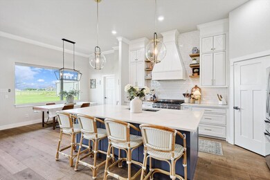 Eat-in kitchen with loads of cabinet space.