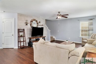 Family Room ~ Door on Left is Storage Closet Under the Stairs