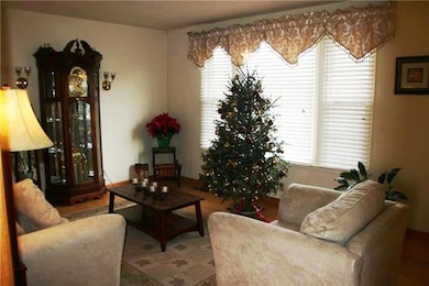 The Separate Living Room could be used as a Formal or Informal, it offers Neutral Paint and Hardwood Floors.