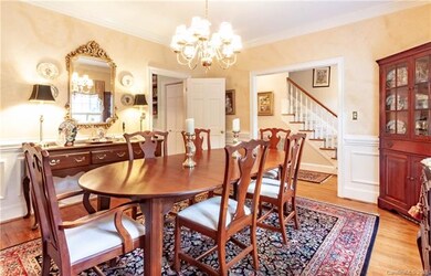 Spacious, elegant dining room, chair rail & heavy 