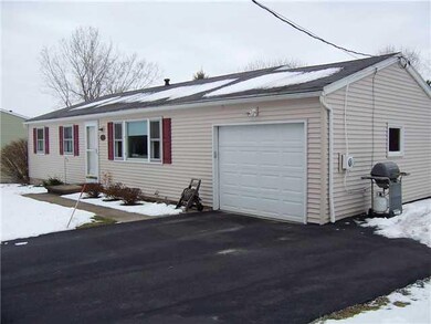 Exterior Front. Oversized driveway 2012.
